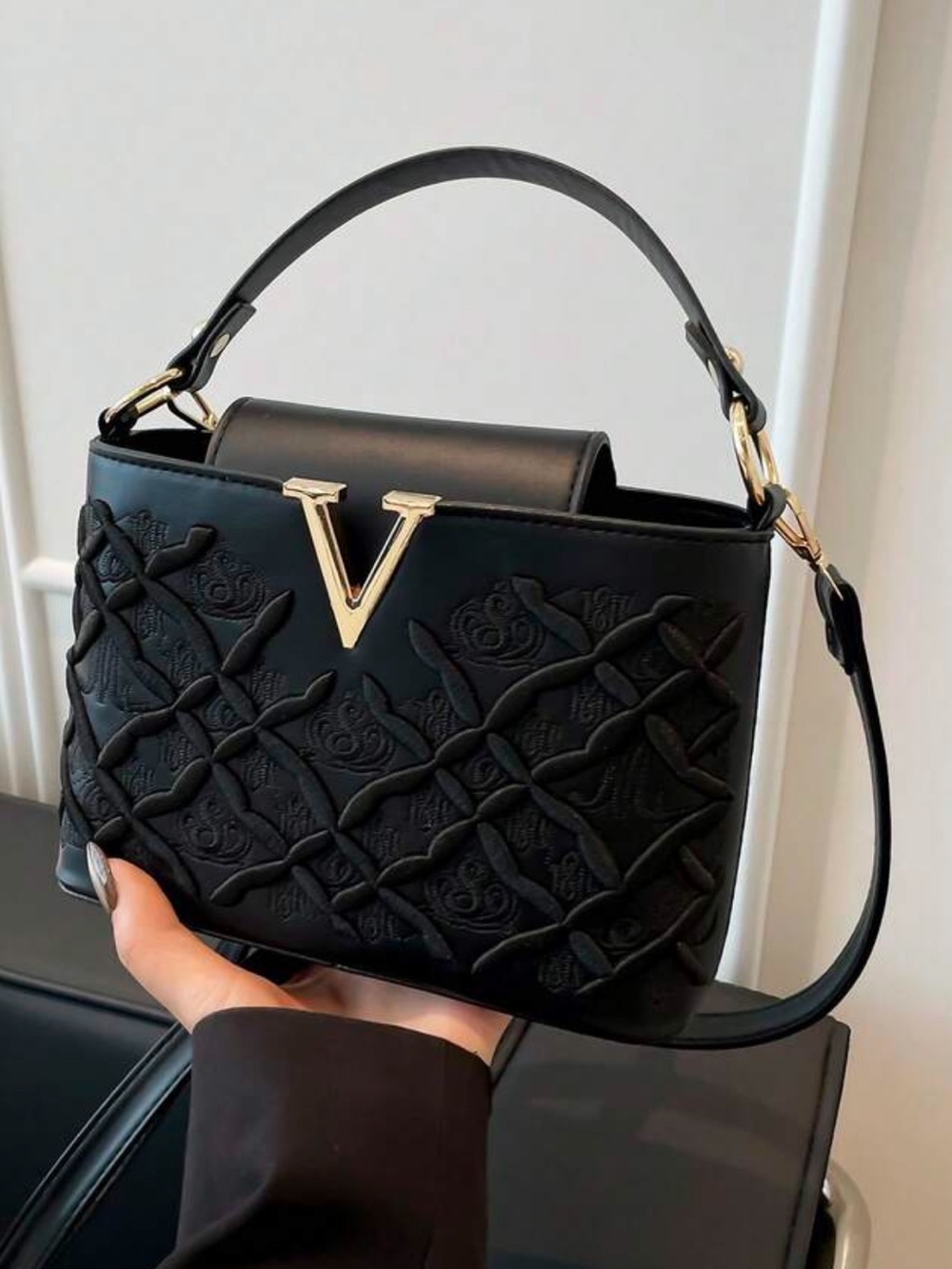 Black Quilted Shoulder Bag with Gold V Accent